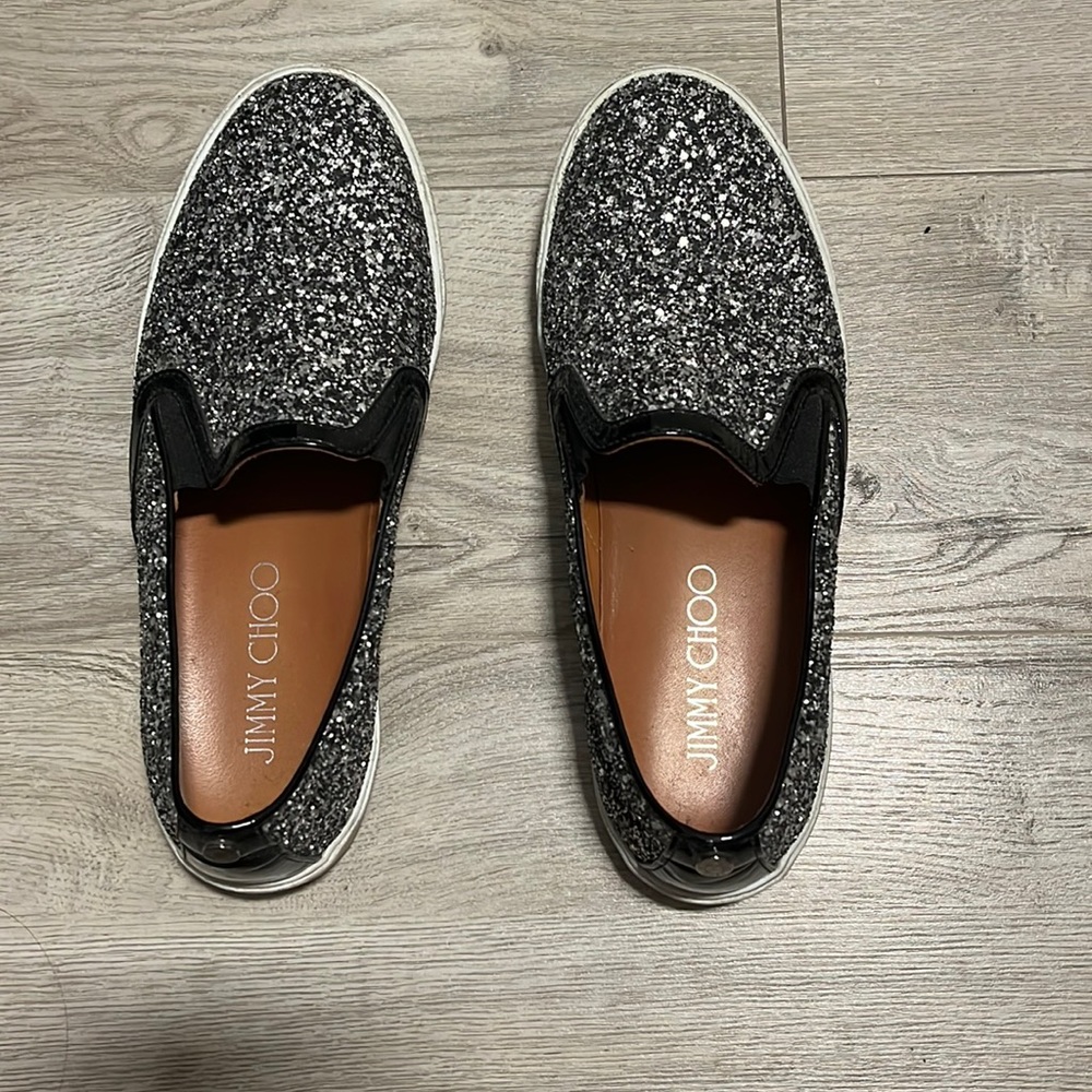 Jimmy Choo flat glitter slip ons in good condition. Some wear on soles.
